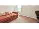 This bedroom with neutral carpet provides a flexible space for sleeping, studying, or relaxing at 716 Mcroy St, Moncks Corner, SC 29461