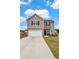 Attractive two-story home with a spacious driveway, well-maintained lawn, and charming curb appeal at 716 Mcroy St, Moncks Corner, SC 29461