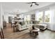 Open concept living area flows into the kitchen, offering a seamless blend of comfort and modern design features at 716 Mcroy St, Moncks Corner, SC 29461