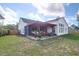 Spacious backyard with screened in porch, patio and fenced perimeter at 7302 Sanderling Ct, Hanahan, SC 29410