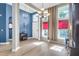 Bright dining area with large windows, elegant lighting, and an open layout perfect for entertaining at 7302 Sanderling Ct, Hanahan, SC 29410