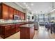 Modern kitchen with stainless steel appliances, granite countertops, and a center island for food preparation at 7302 Sanderling Ct, Hanahan, SC 29410