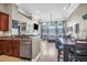 Open concept living space with hardwood floors, modern fixtures, and lots of natural light at 7302 Sanderling Ct, Hanahan, SC 29410