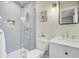 Modern bathroom featuring stylish gray tiled shower and marble countertop vanity at 734 Fort Sumter Dr, Charleston, SC 29412