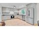 Bright kitchen with stainless steel appliances, ample counter space, and stylish finishes for cooking and entertaining at 734 Fort Sumter Dr, Charleston, SC 29412