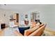 Spacious living room with open layout to the kitchen, featuring hardwood floors and comfortable seating at 734 Fort Sumter Dr, Charleston, SC 29412