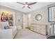 Spacious Bedroom with a rocking chair, closet, and dresser with ample storage at 803 Burnett Dr, Charleston, SC 29412