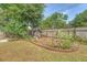 Backyard chicken coop with fencing, plants, and natural elements for an outdoor living space at 803 Burnett Dr, Charleston, SC 29412