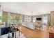 Spacious living room with hardwood floors, large windows, and stylish decor at 803 Burnett Dr, Charleston, SC 29412