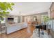 Bright living room showcasing an open layout, hardwood floors, and a view to the kitchen at 803 Burnett Dr, Charleston, SC 29412