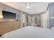 Well-lit main bedroom with hardwood floors, a walk-in closet, and serene decor at 803 Burnett Dr, Charleston, SC 29412