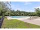A large community pool offers a refreshing escape with ample lounging space for relaxation and enjoyment at 911 Hunt Club, Charleston, SC 29414