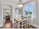 Bright breakfast nook with hardwood floors and large windows, perfect for morning meals and casual dining at 911 Hunt Club, Charleston, SC 29414