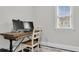 Office with computer on desk, white walls, white trim, and a window for natural light at 911 Hunt Club, Charleston, SC 29414