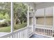 This home features a screened-in porch offering a relaxing view of the well-maintained backyard at 911 Hunt Club, Charleston, SC 29414
