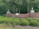 Well manicured landscaping surrounding the Hunt Club brick sign at 911 Hunt Club, Charleston, SC 29414