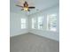 Neutral bedroom features ceiling fan, light walls, white trim, and plantation shutters at 977 Warrick Oaks Ln, Mount Pleasant, SC 29464