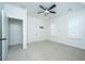 Spacious bedroom with neutral carpeting, white trim, and a ceiling fan for added comfort at 977 Warrick Oaks Ln, Mount Pleasant, SC 29464