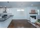 Dining room featuring an eat-in kitchen, fireplace and wood flooring at 977 Warrick Oaks Ln, Mount Pleasant, SC 29464