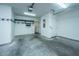 Spacious and clean garage with painted walls and concrete floors, ready for parking and storage at 977 Warrick Oaks Ln, Mount Pleasant, SC 29464