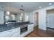Eat-in kitchen with stainless steel microwave, granite countertops, and open to living area at 977 Warrick Oaks Ln, Mount Pleasant, SC 29464