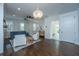 Bright and open living room with hardwood floors, fireplace, and modern furnishings at 977 Warrick Oaks Ln, Mount Pleasant, SC 29464