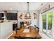 Open dining area with wooden table and stylish decor near the kitchen at 1007 Whitlow Blvd, Summerville, SC 29483
