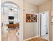 Bright hallway featuring hardwood floors, decorative archways, and a view into the living space at 1007 Whitlow Blvd, Summerville, SC 29483