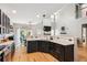 Spacious kitchen features dark cabinets, white countertops, and stainless steel appliances at 1007 Whitlow Blvd, Summerville, SC 29483
