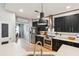Stylish kitchen features stainless steel appliances, island sink and dark cabinetry at 1007 Whitlow Blvd, Summerville, SC 29483