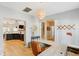 Bright office with hardwood floors, modern lighting, and views of the kitchen and hallway at 1007 Whitlow Blvd, Summerville, SC 29483