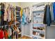 Organized walk-in closet with clothing racks, shelving, and hardwood floors at 1007 Whitlow Blvd, Summerville, SC 29483