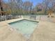 A small, fenced kiddie pool and shaded seating for supervising children at the community swimming pool at 101 Plantation Dr, Summerville, SC 29485