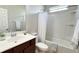Cozy bathroom with a single sink vanity, toilet, and a bathtub with shower at 115 Hyrne Dr, Goose Creek, SC 29445