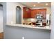 Contemporary kitchen with granite counters, stainless steel appliances, and dark wood cabinets at 115 Hyrne Dr, Goose Creek, SC 29445