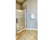 Shower with glass door, chrome fixtures, and tiled floor in a neutral color at 115 Hyrne Dr, Goose Creek, SC 29445