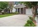 Brick townhome featuring a covered porch and a one-car garage at 116 Venezia Ct, Ladson, SC 29456