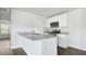 Modern kitchen with granite countertops, stainless steel appliances, and white cabinetry at 117 Mims Academy Dr, Harleyville, SC 29448