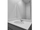 Bathroom featuring sleek sink, quartz countertop, and a stylish mirror at 119 Mims Academy Dr, Harleyville, SC 29448