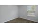 Bright bedroom with hardwood floors and large window at 119 Mims Academy Dr, Harleyville, SC 29448