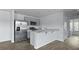 Stylish kitchen with stainless steel appliances, granite countertops, and light gray cabinetry at 119 Mims Academy Dr, Harleyville, SC 29448