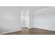 Bright and airy living room features wood-look floors and neutral decor at 119 Mims Academy Dr, Harleyville, SC 29448