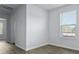 Well-lit living room displaying wood-look floors and a peaceful atmosphere at 119 Mims Academy Dr, Harleyville, SC 29448