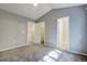 Bedroom featuring carpet, neutral paint, and doors to a closet and hallway at 1201 Pine Bluff Dr, Summerville, SC 29483