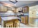 Bright kitchen features granite countertops, stainless steel appliances, and a breakfast bar for casual dining at 1201 Pine Bluff Dr, Summerville, SC 29483
