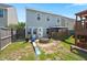 Well maintained backyard with patio, fire pit, playset, and gazebo for outdoor living and entertainment at 127 Longford Dr, Summerville, SC 29483