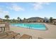 Community pool with lounge chairs and ample space for relaxation in a well-maintained setting at 127 Longford Dr, Summerville, SC 29483