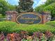Community entrance sign that says 'Wentworth Hall' with lush landscaping and decorative lighting at 127 Longford Dr, Summerville, SC 29483