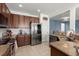 Well-lit kitchen featuring stainless steel appliances, granite countertops, and stylish cabinets at 127 Longford Dr, Summerville, SC 29483