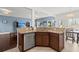 Open-concept kitchen with granite countertops, stainless steel dishwasher, and seamless flow to living spaces at 127 Longford Dr, Summerville, SC 29483